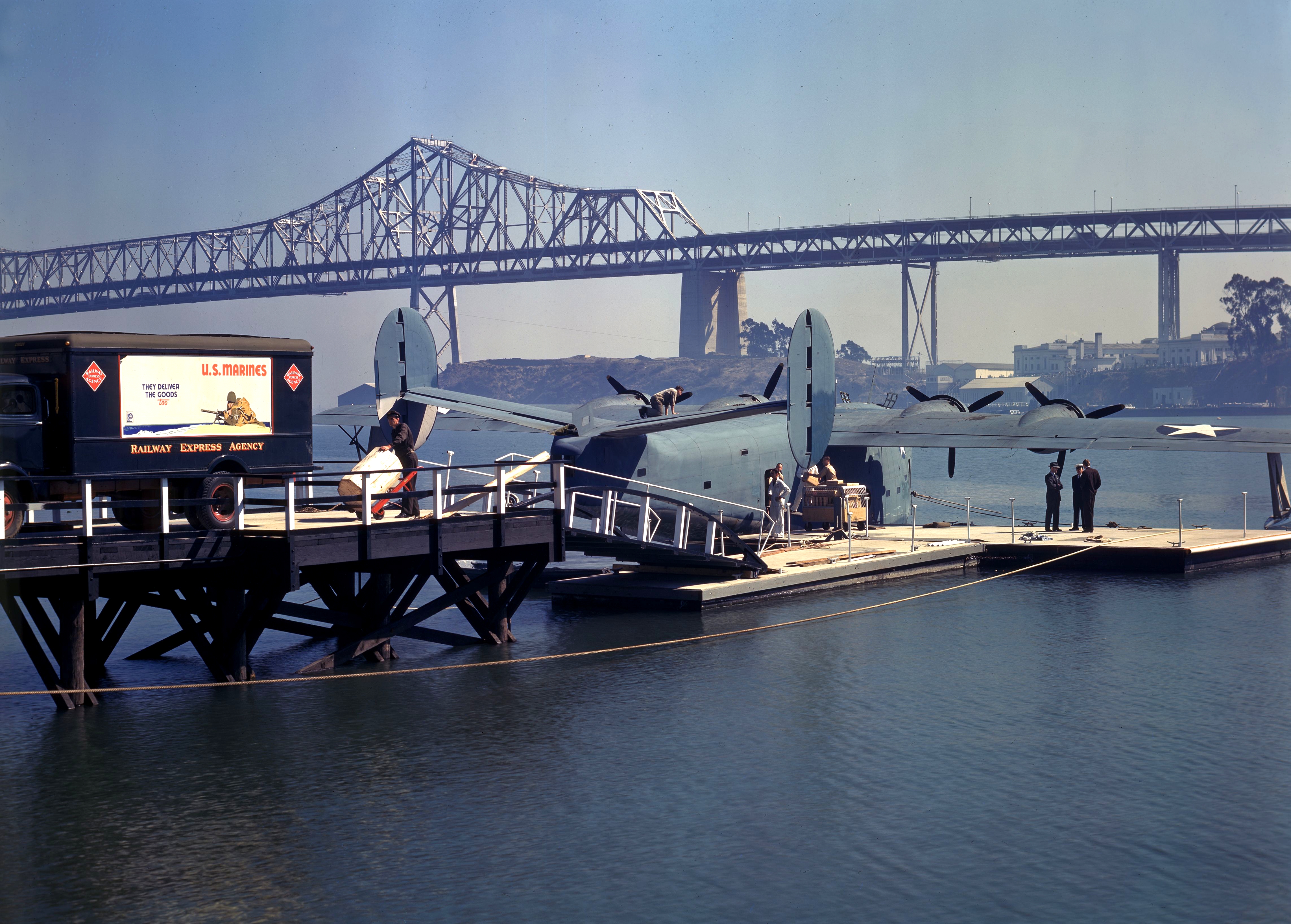 Consolidated_PB2Y-3R_Coronado_loads_cargo_at_the_Pan_American_Airways_dock,_Treasure_Island,_California_(USA),_in_January_1943_(80-G-K-1149)
