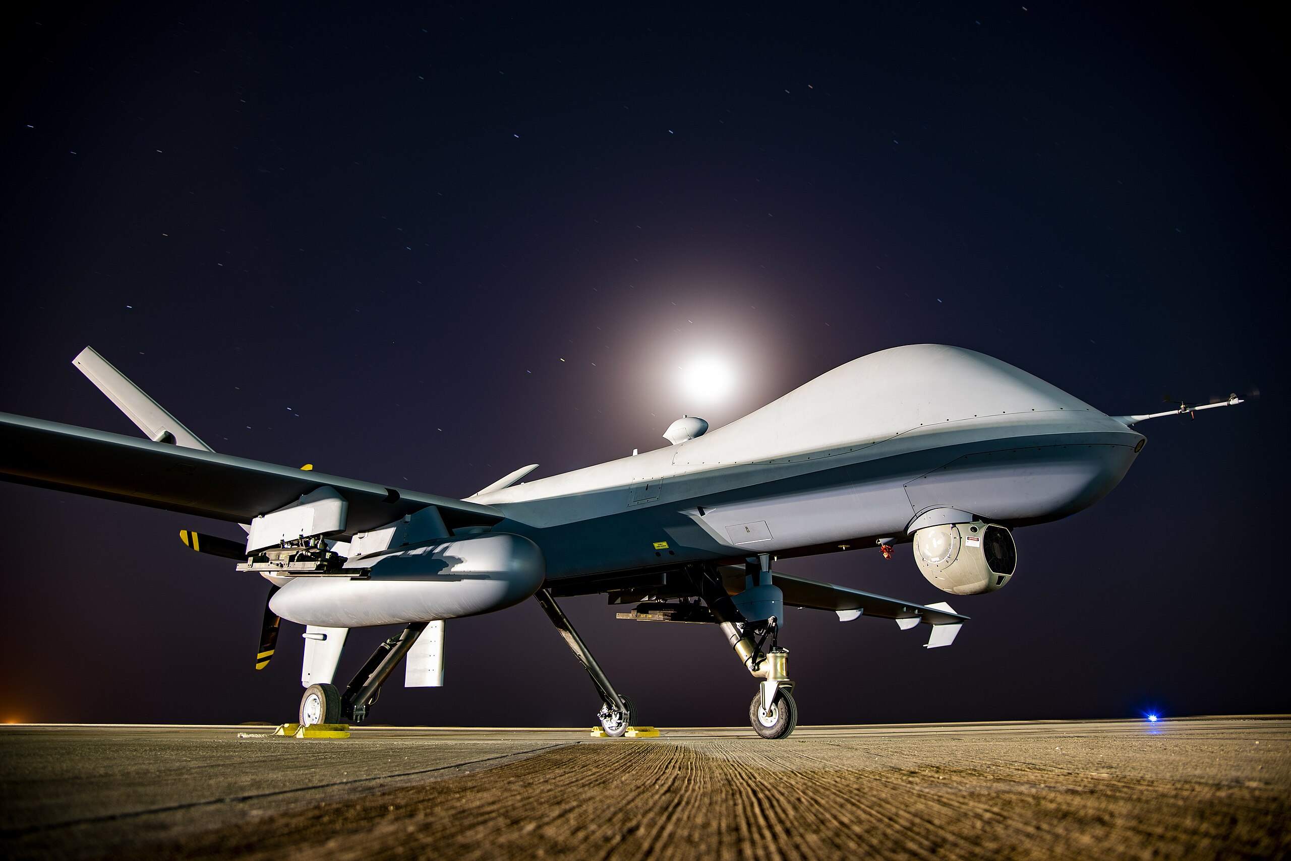 An_MQ-9_Reaper_sits_on_the_361_Expeditionary_Attack_Squadron_flightline_at_an_undisclosed_location,_Aug._6,_2022